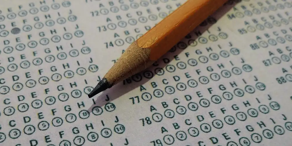 essay on standardized testing pros and cons