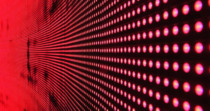 An image of red light-emitting diodes on a screen panel used for an article that describes the pros and cons of Mini-LED display technology.